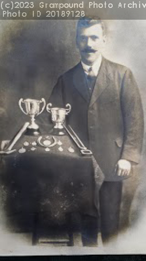 Picture of Blacksmith Bert Cundy with prizes