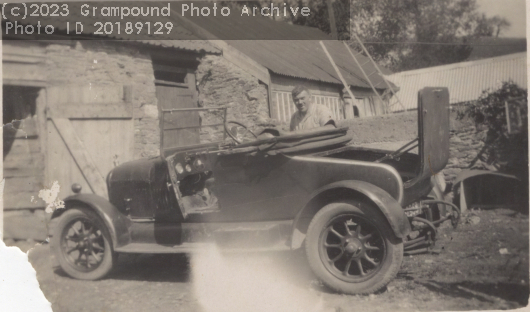 Picture of Thomas H Cundy with an old car