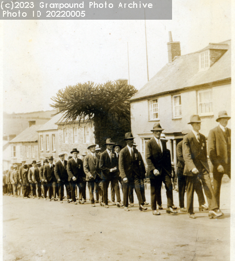 Picture of Hospital Sunday 1928, men marching up Fore Street